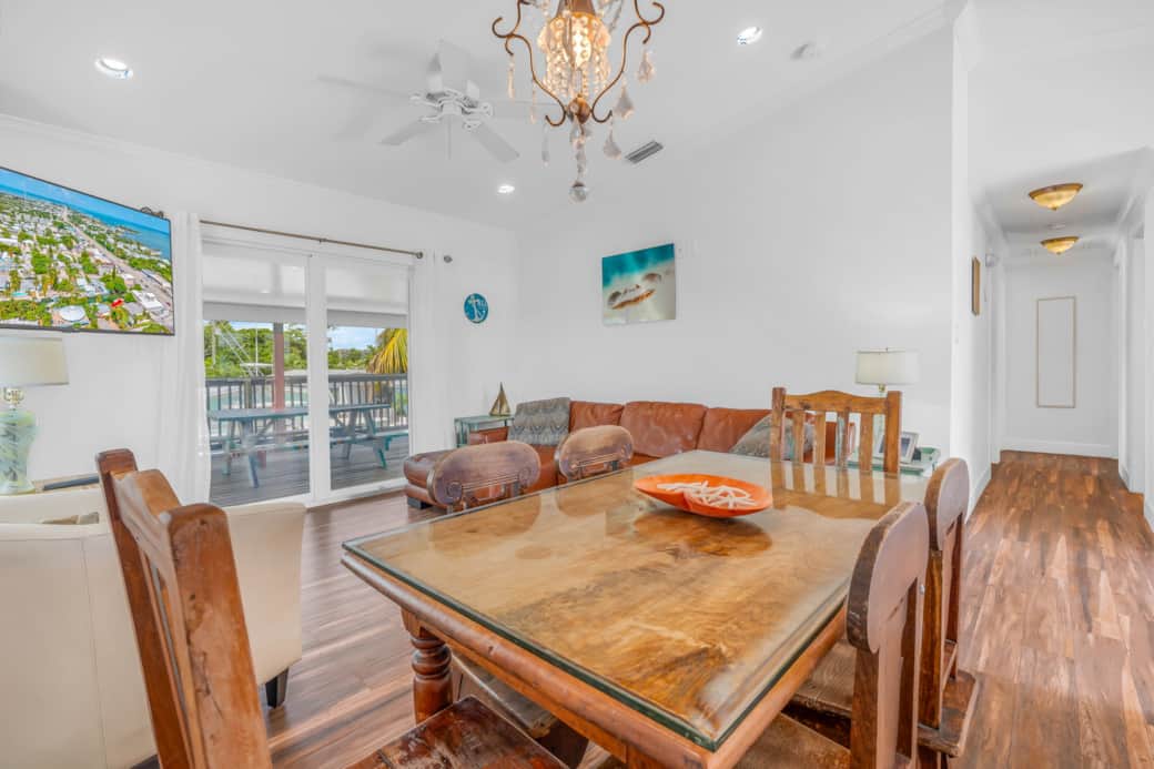 Dining area and living area with 55' TV