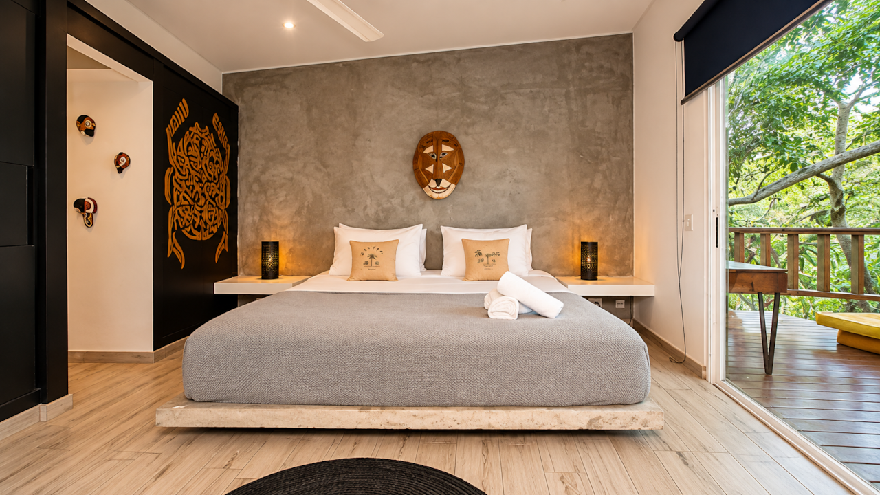Master Suite opening to the treetops at Saboga Lodge, a Pearl Islands eco lodge