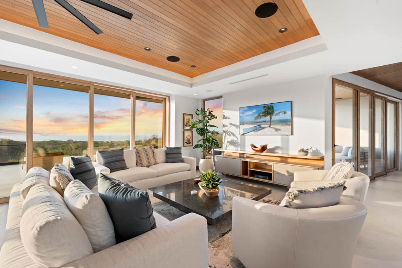 Living room with panoramic Pacific Ocean views at sunset - Villa Zaya, Reserva Conchal
