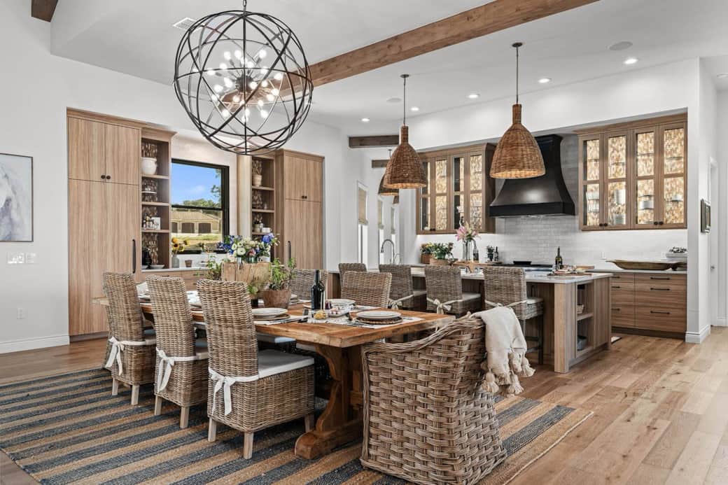 Sophisticated, spacious, and styled to perfection—entertain in elegance in this luxurious kitchen and dining area.