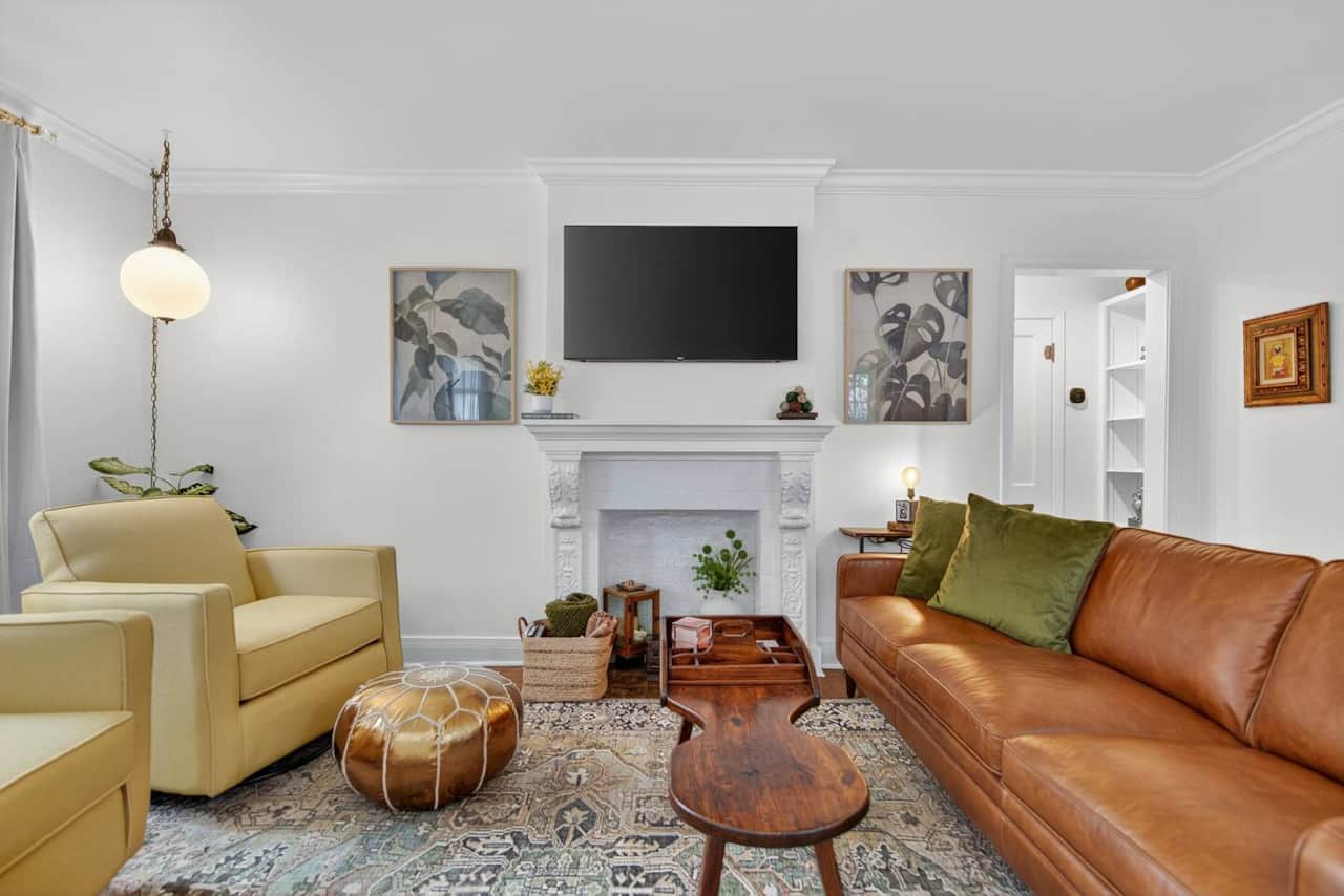 Open and bright living area with blackout curtains for movie night!