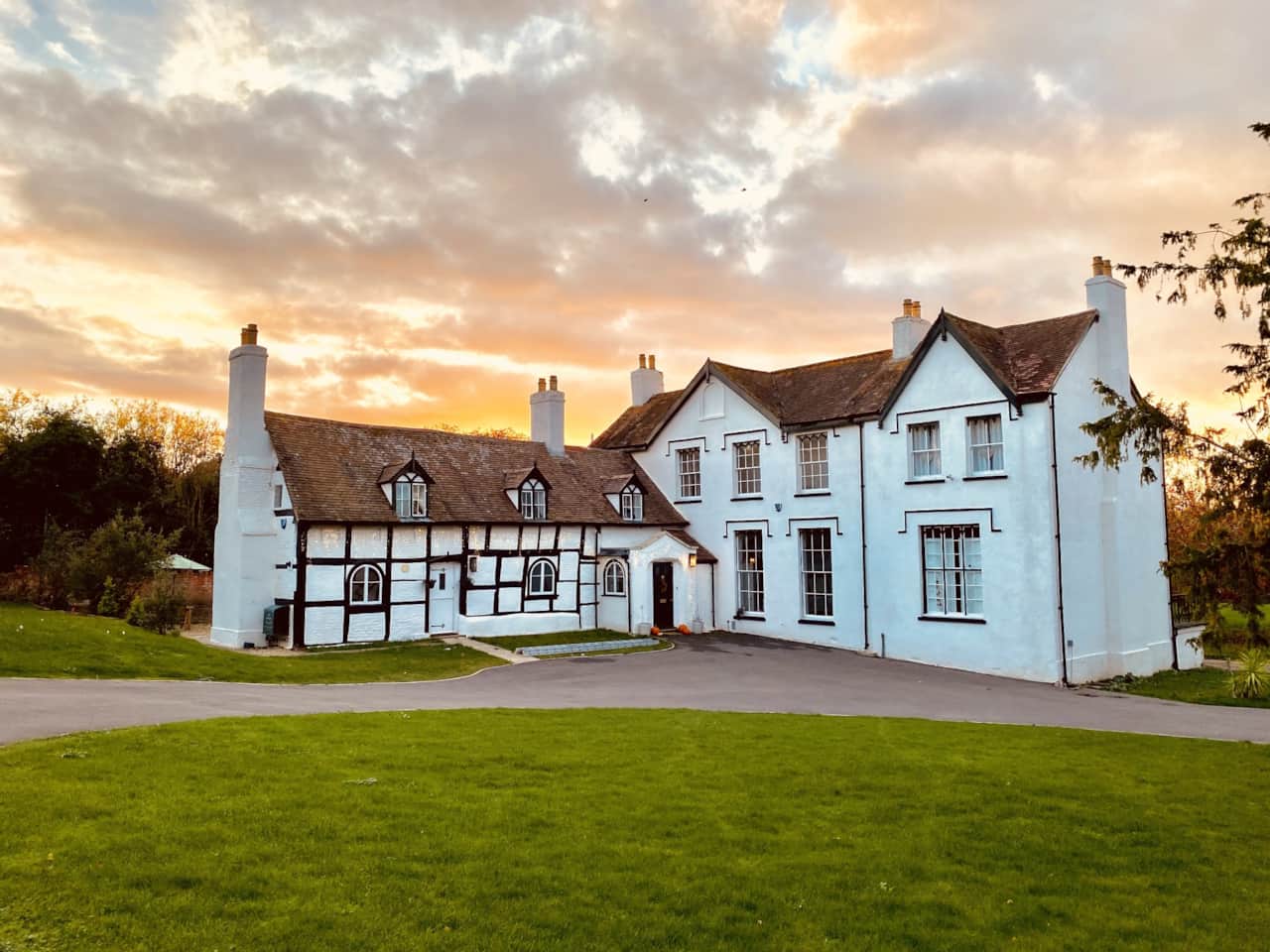 Evington House at sunset — Tudor and Georgian character