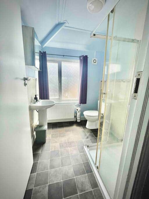 Family bathroom with corner shower. Family bathroom with corner shower.