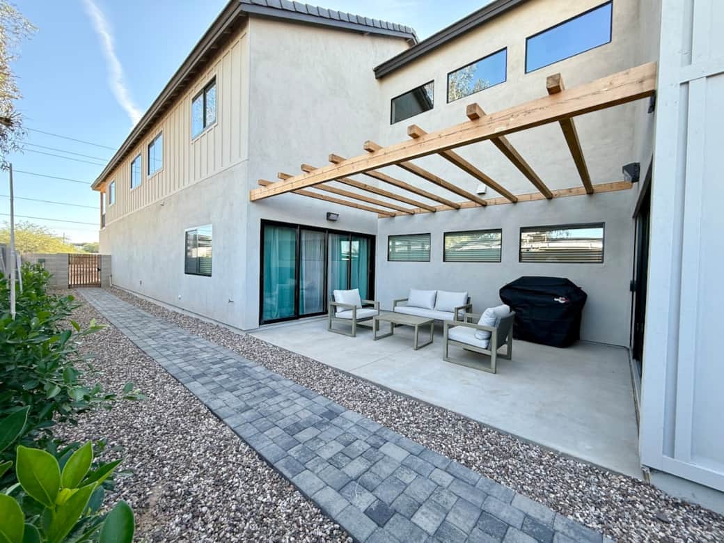Backyard courtyard perfect for morning coffee, grilling a meal or for you and your dogs to get some fresh air. This courtyard is on the North side of the home and is shaded all day which is important in Arizona :)
