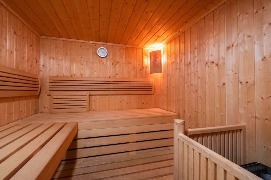 Wooden sauna upstairs, providing a perfect relaxation space after a day in the mountains.