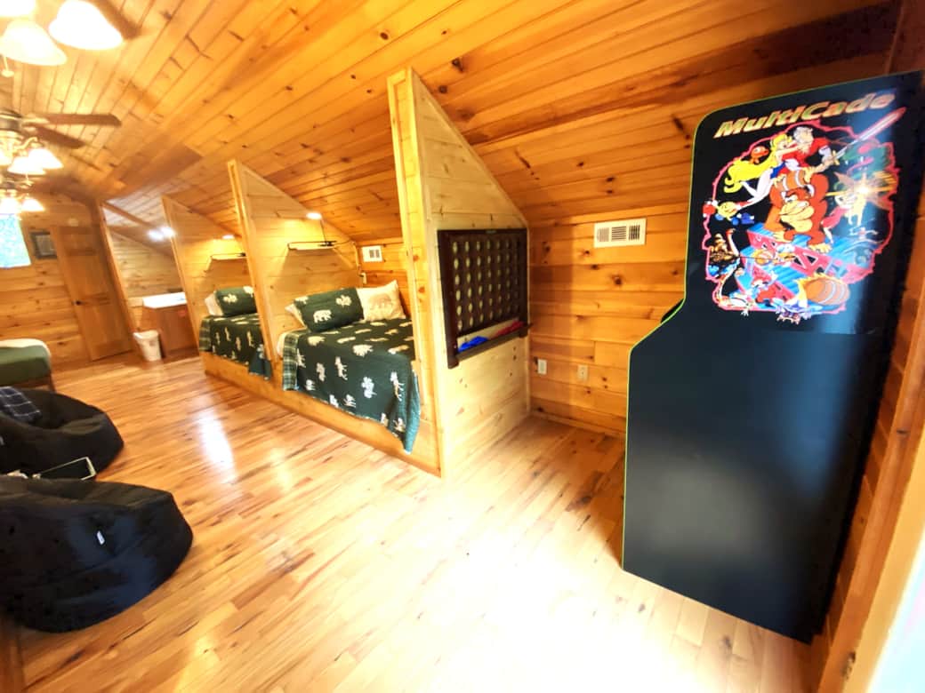 Built in twin beds in loft / Game area