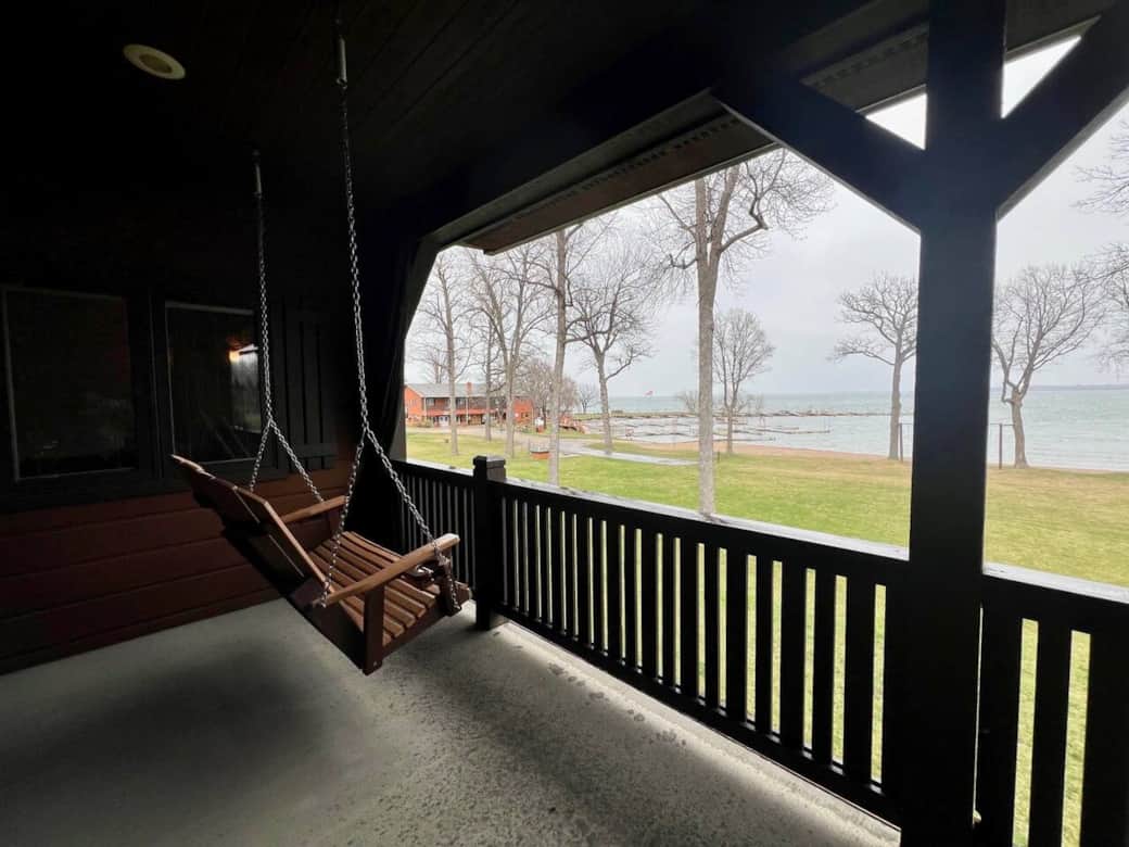 Take in the lake/beach view with a cup of coffee sitting in the porch swing