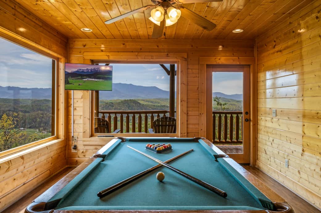 Enjoy a game of pool from the lower level game room, while being surrounded by panoramic views