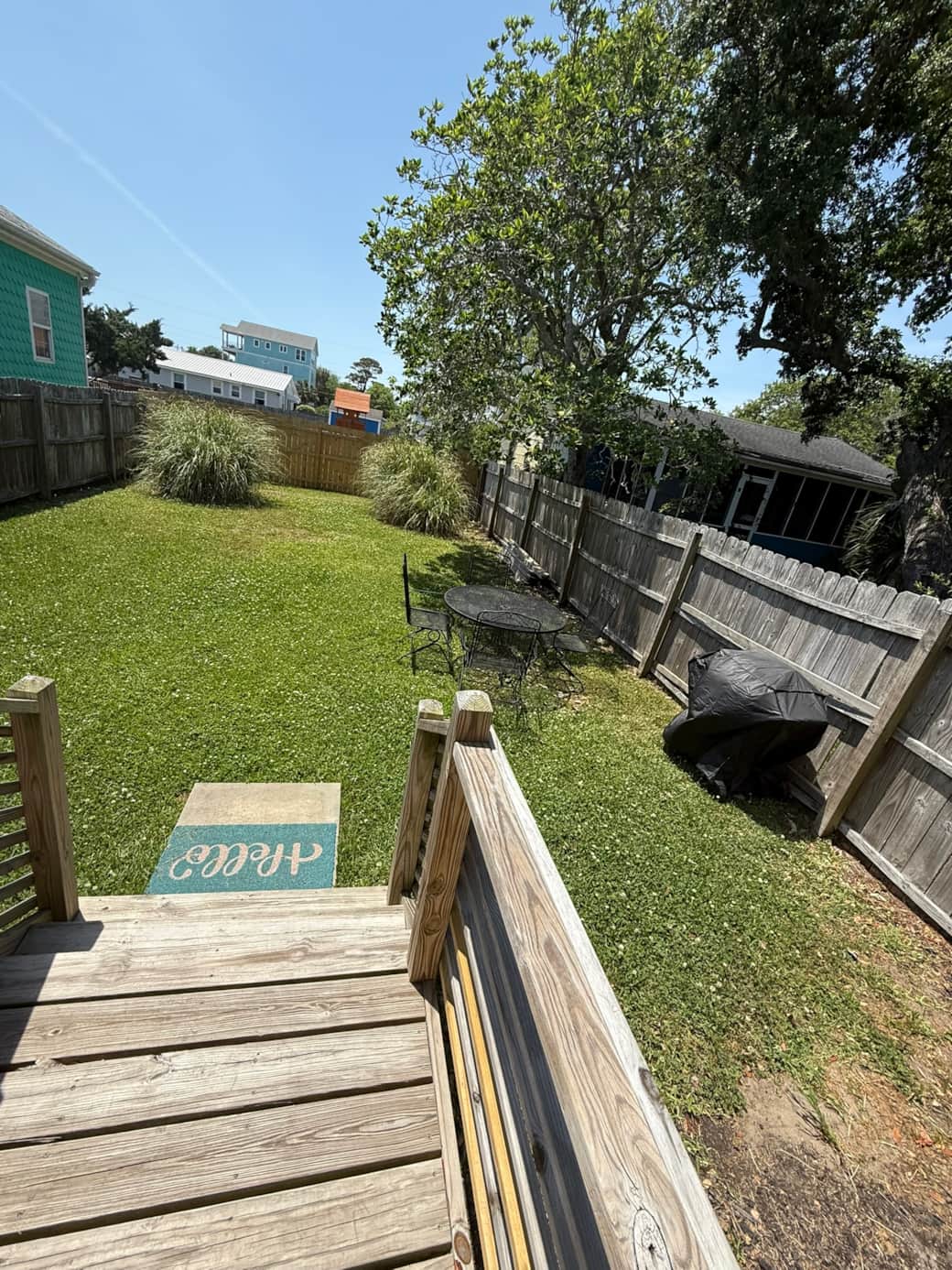 Backyard (50'X30'). Great for dogs and kids to run around. Includes table and grill. Backyard (50'X30'). Great for dogs and kids to run around. Includes table and grill.