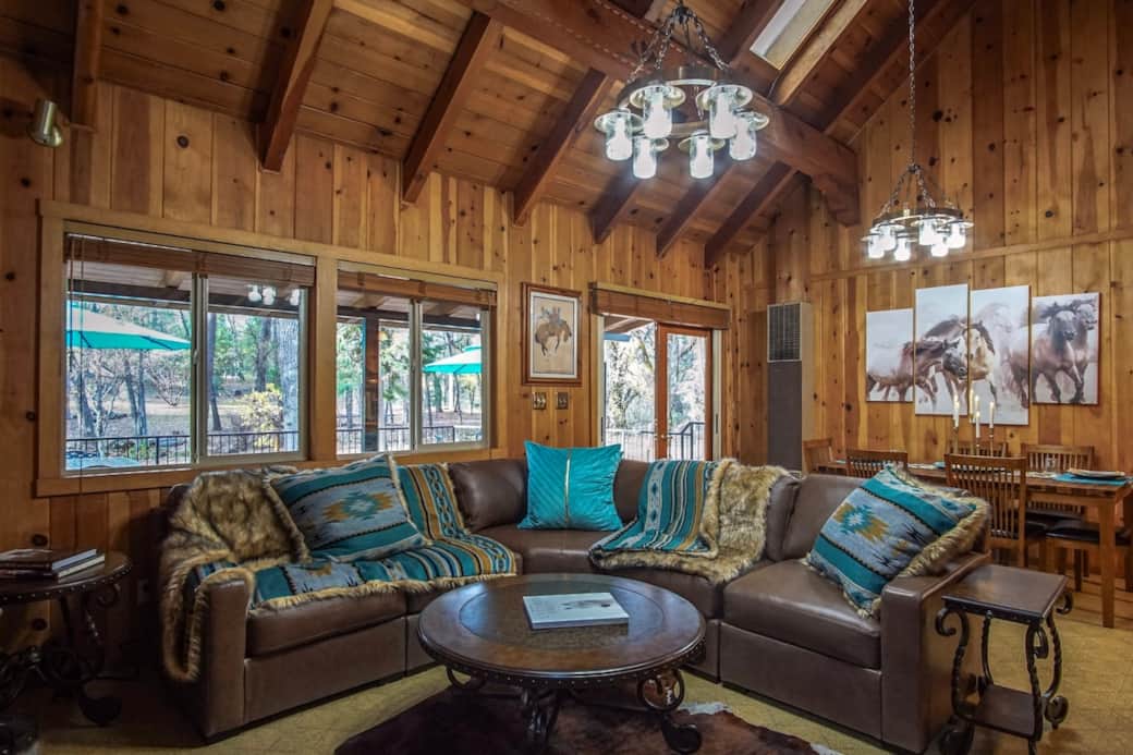 Warm lodge vibes: exposed beams, rustic chandeliers, plush leather seating, and bold turquoise textiles. A bright, open space for relaxing, reconnecting, and savoring forest views just beyond the windows.
Warm lodge vibes: exposed beams, rustic chandeliers, plush leather seating, and bold turquoise textiles. A bright, open space for relaxing, reconnecting, and savoring forest views just beyond the windows.