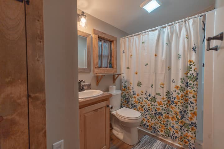 Unwind and wash away the day's worries in our immaculate bathroom with a soothing shower.