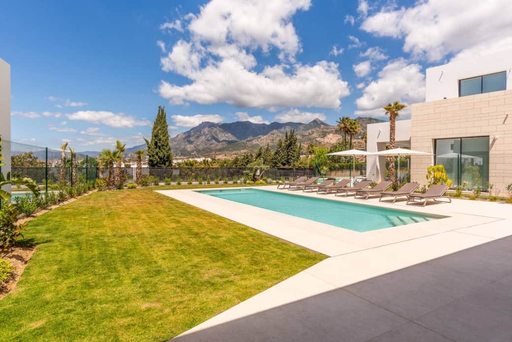 view of the pool and garden