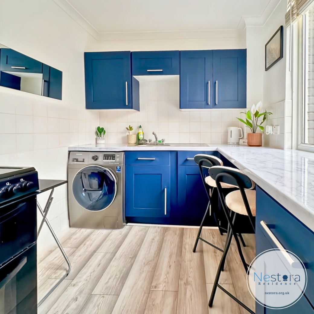 Nestora Residence - Camberwell - Fully Equipped Kitchen with Blue Cabinets and Washing Machine
