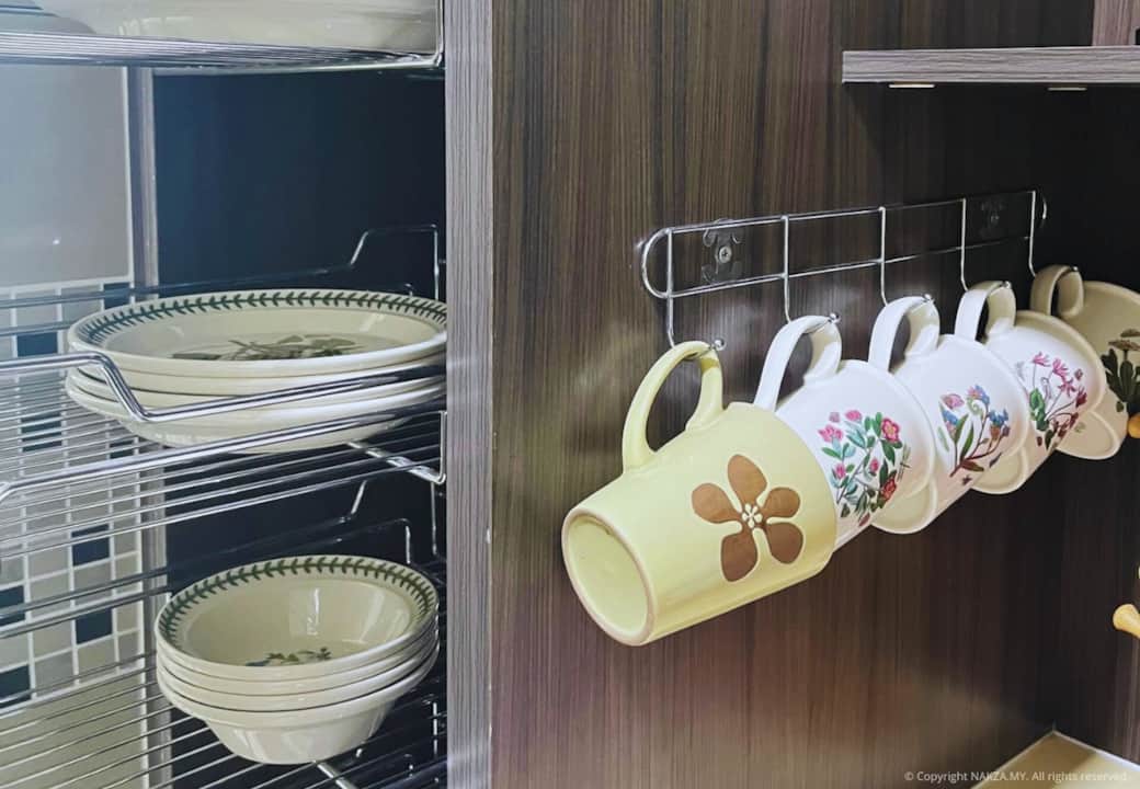 Organized kitchen dish rack and cup display. Organized kitchen dish rack and cup display.