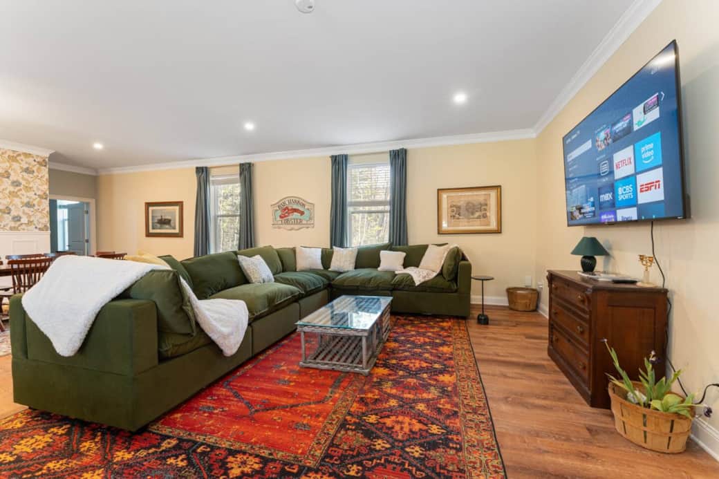 Super cozy and high end couch with 70" smart TV - in the main downstairs living room