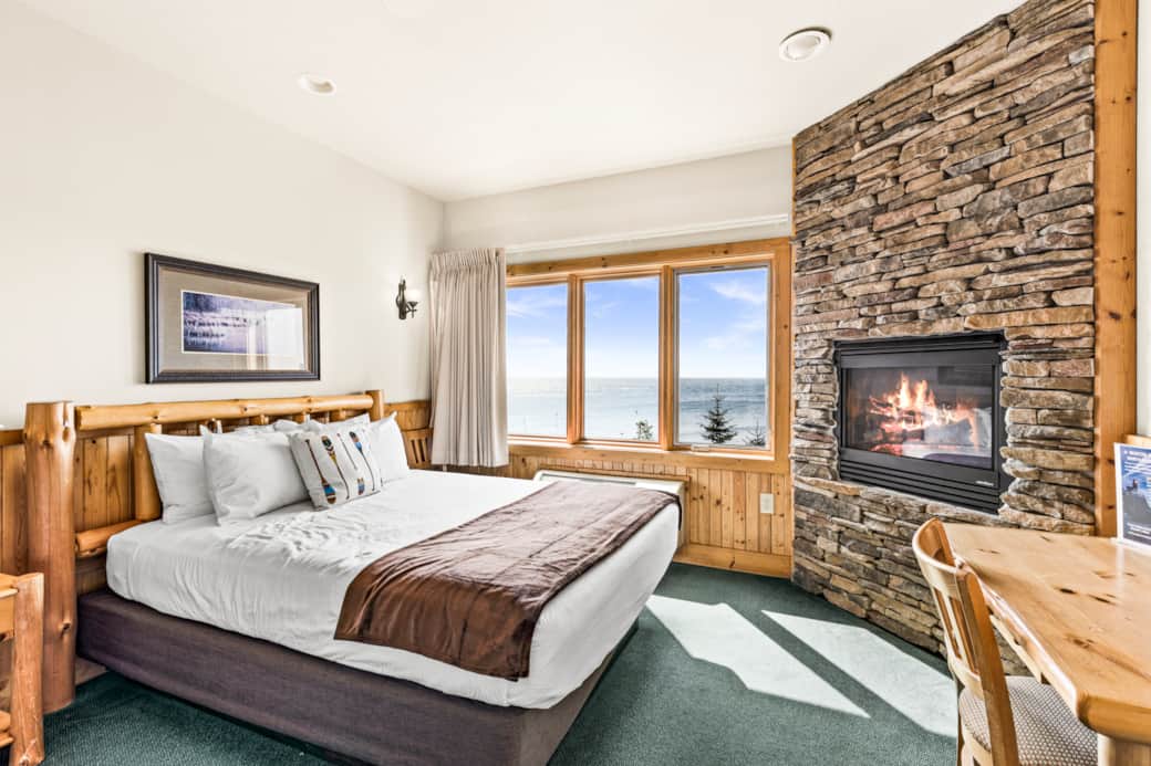Warm up by the fire while gazing out at the endless beauty of Lake Superior