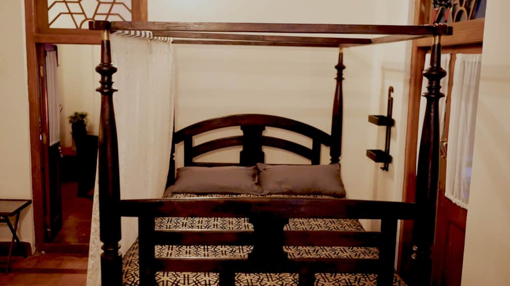 Nazara’s four-poster bed — where elegance, comfort, and history embrace.