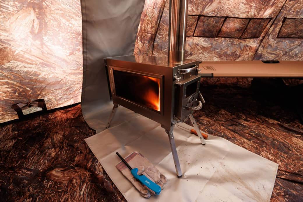 Wood stove, 2 cots, 2 camp chairs, LED Light Wood stove, 2 cots, 2 camp chairs, LED Light