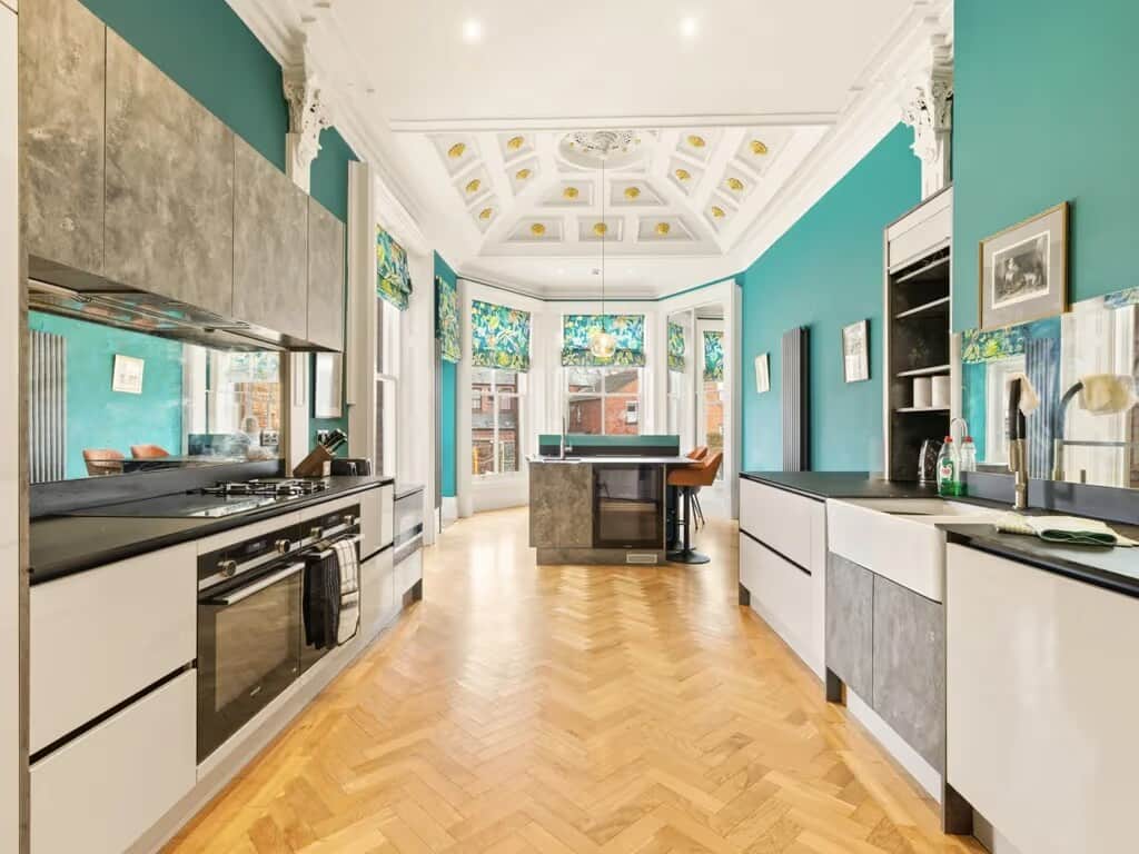 Fully equipped kitchen with generous space for preparing meals and dining together.