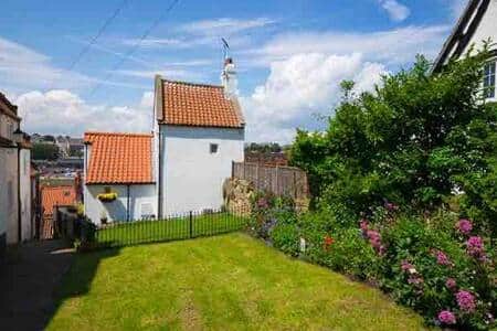 Enclosed fenced and gated garden. Enclosed fenced and gated garden.