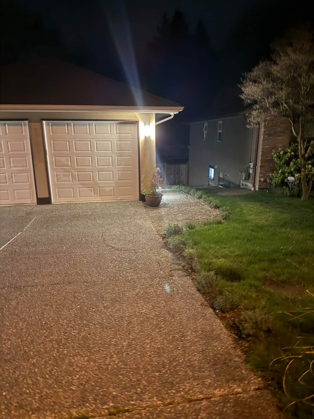 Path to suite to right of garage Path to suite to right of garage