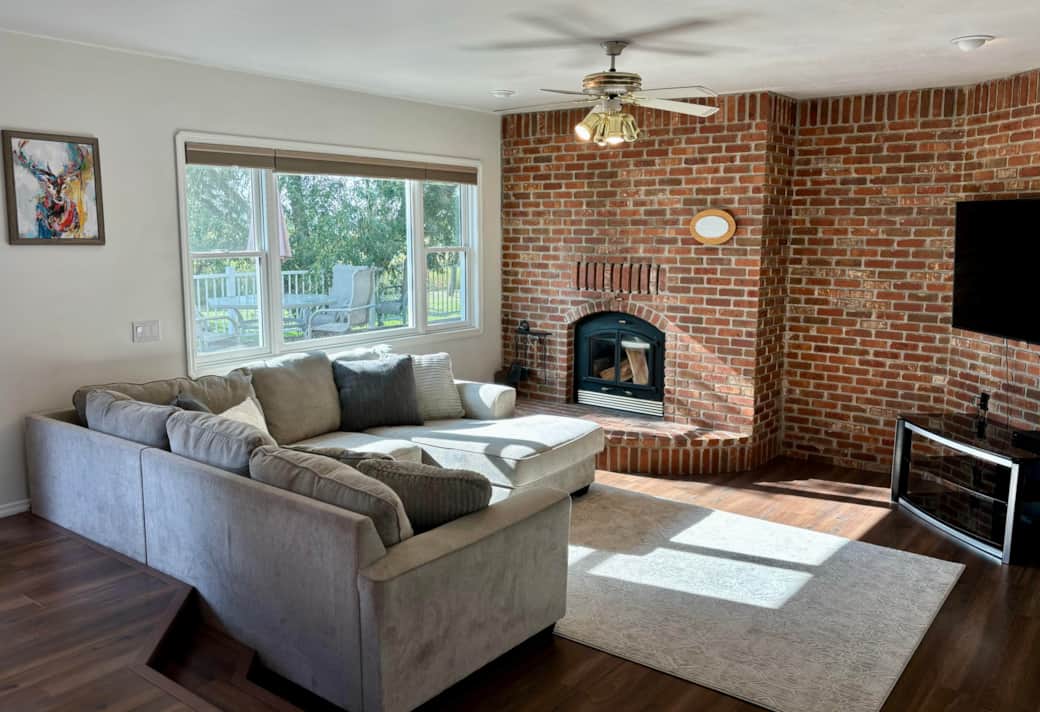 Specious and sunlit living room attached to kitchen