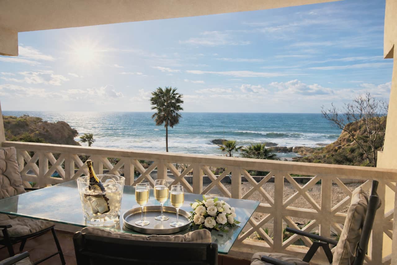 Sea-view balcony with dining table