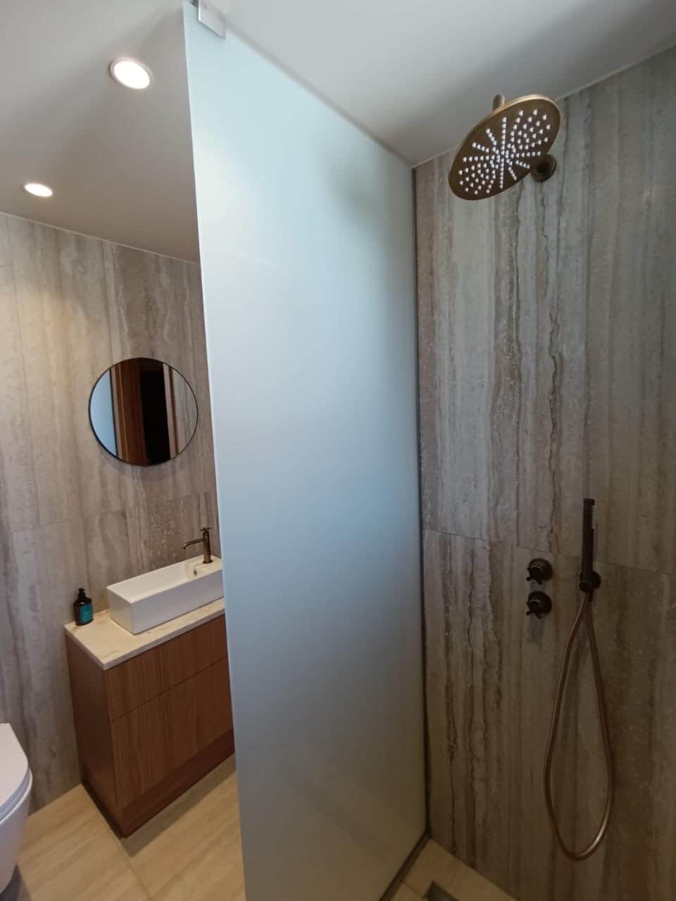 First floor shower and custom oak vanity