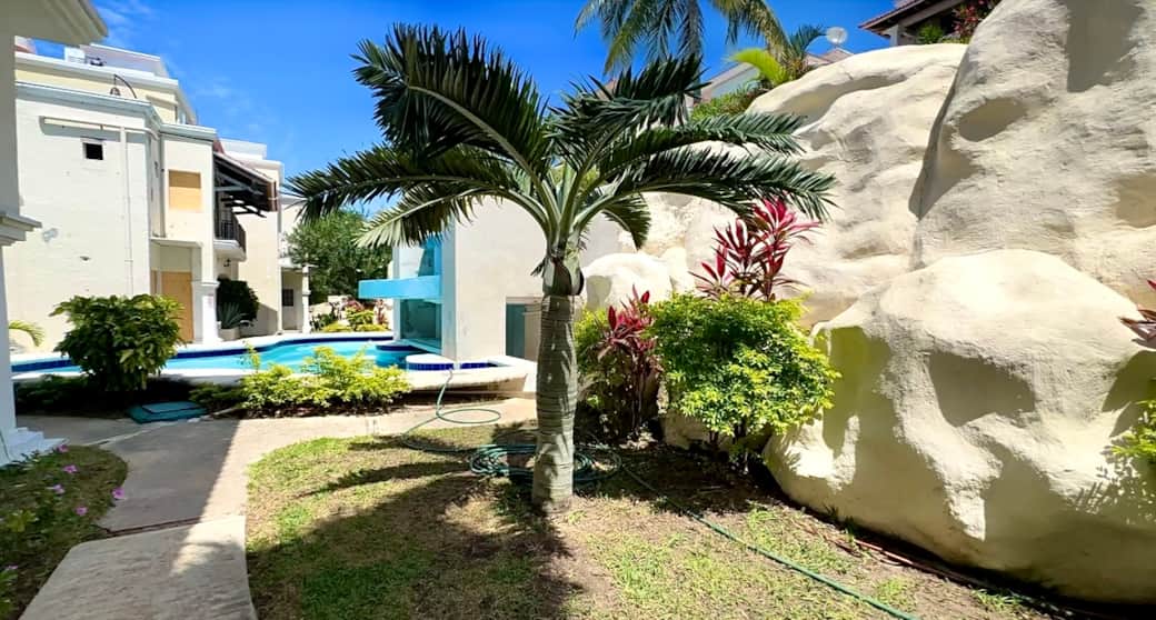 Enjoy the lush gardens that surround the house