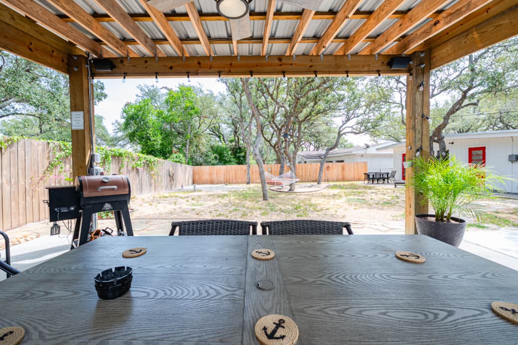 The fully fenced backyard is perfect for hanging out as a family or group. 