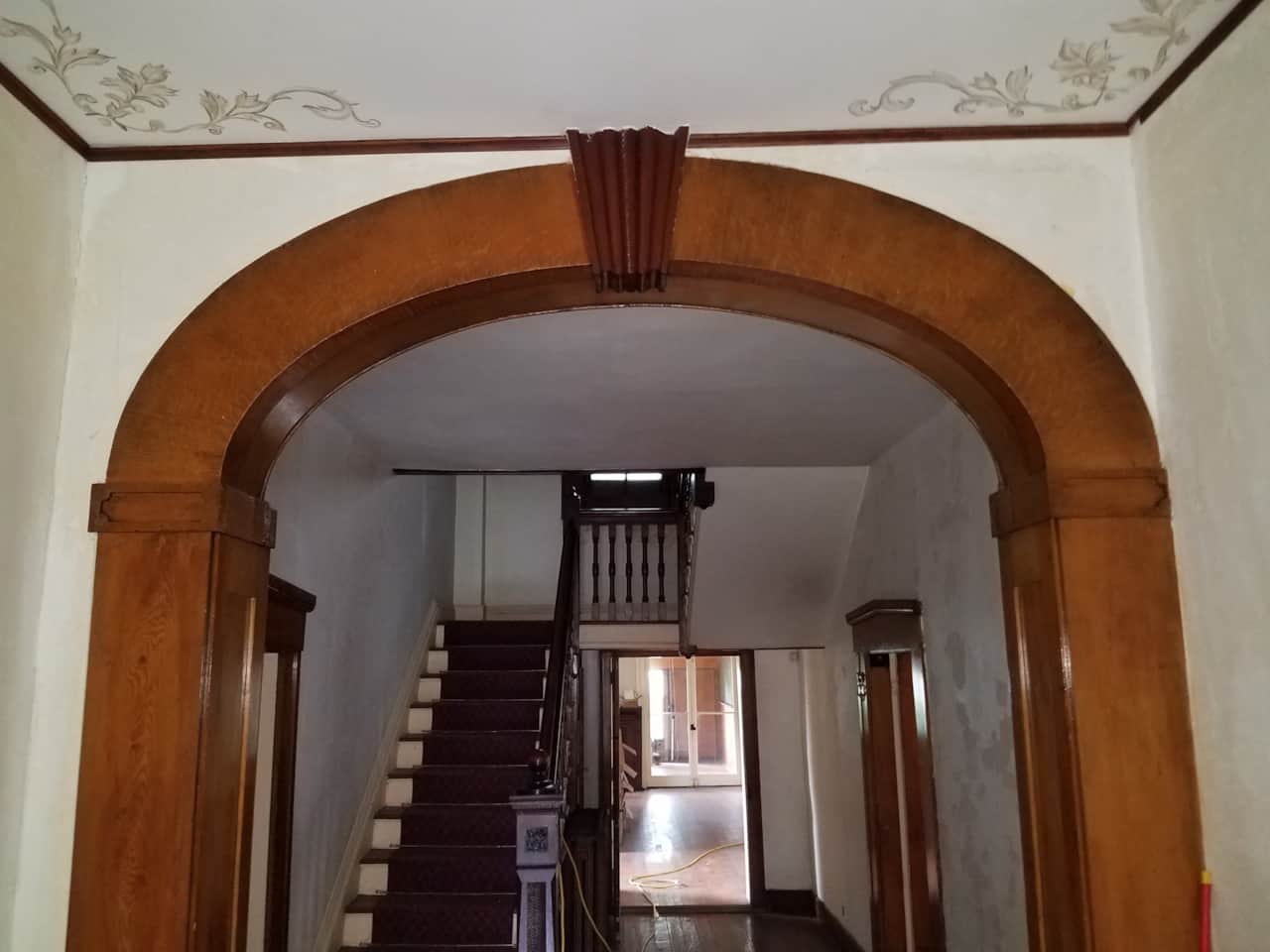 Sandstone federal arch with faux woodgrain paint