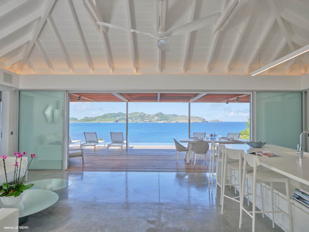 Spacious open-concept living room inside Villa Pointe Milou with refined design