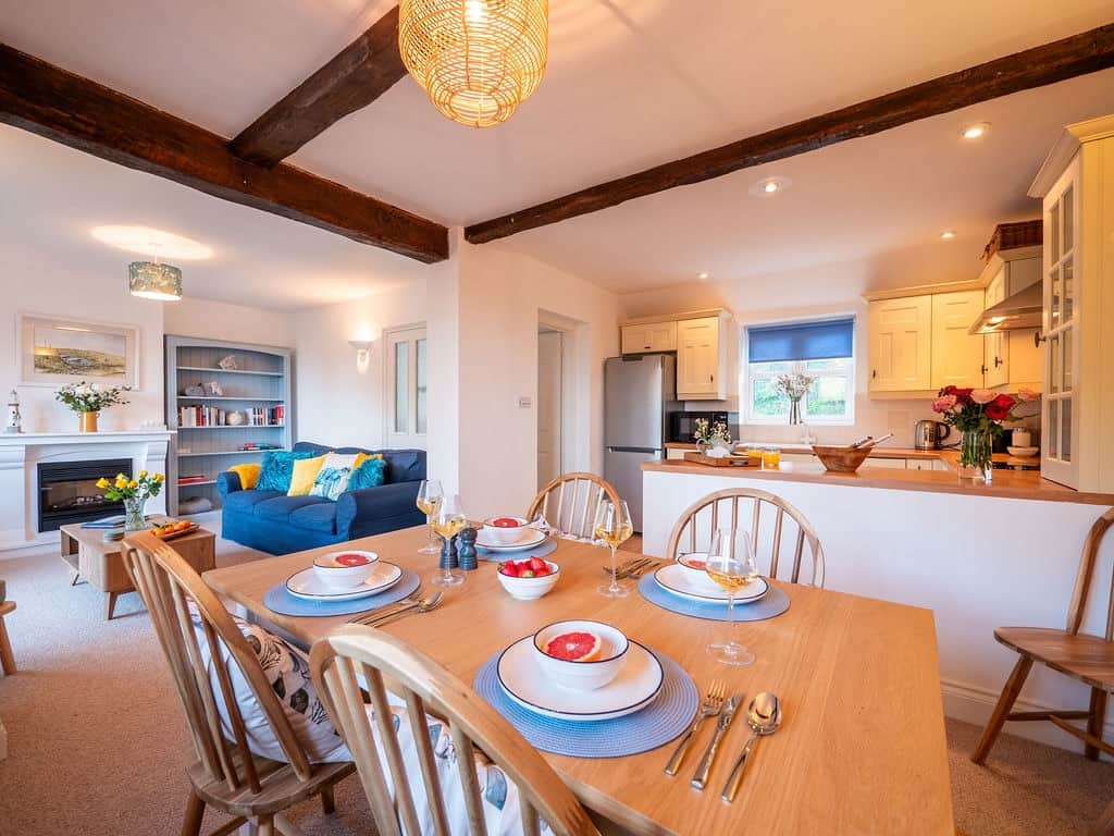 Lounge, Dining and kitchen area with exposed beams