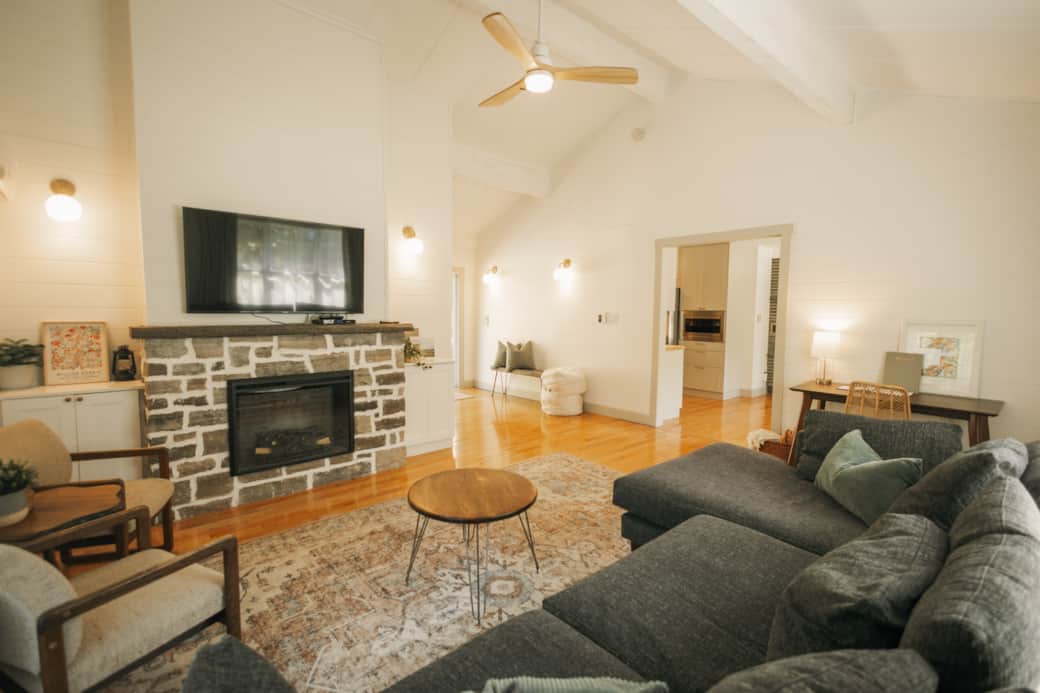 Living room with cathedral ceilings and ample seating Living room with cathedral ceilings and ample seating