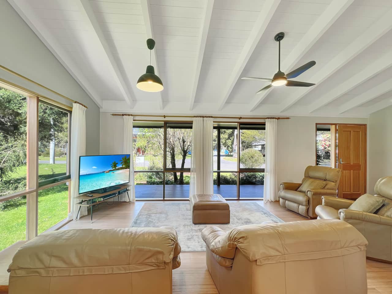 Relax in our bright living area, flooded with natural light for an inviting atmosphere.