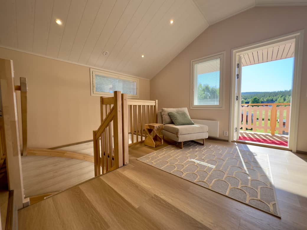 Entrance is on the first floor. A sleeper armchair for a fifth guest and a door to the balcony.