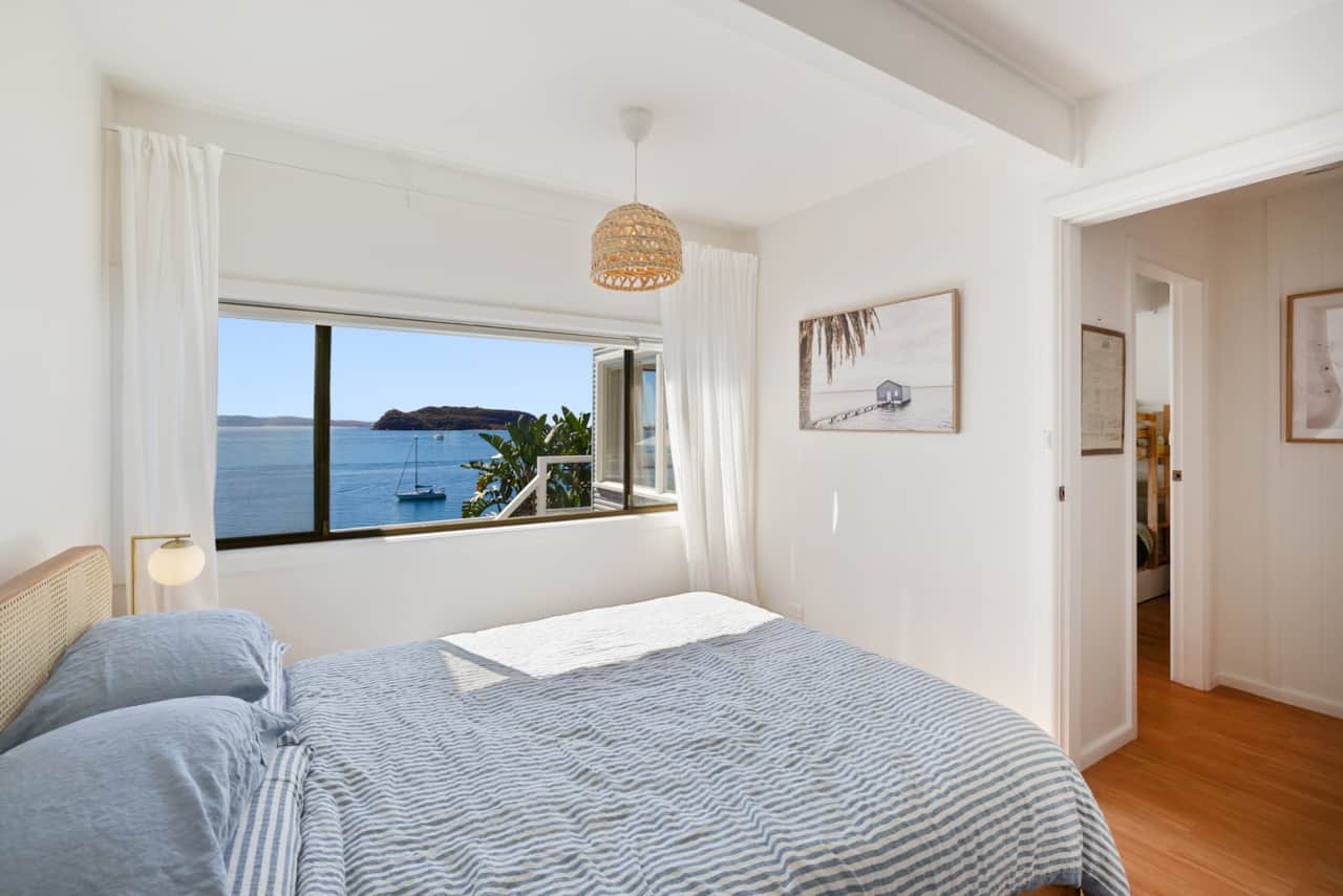 Queen bedroom - waking up to sunrise over Barrenjoey headland is simply gorgeous!