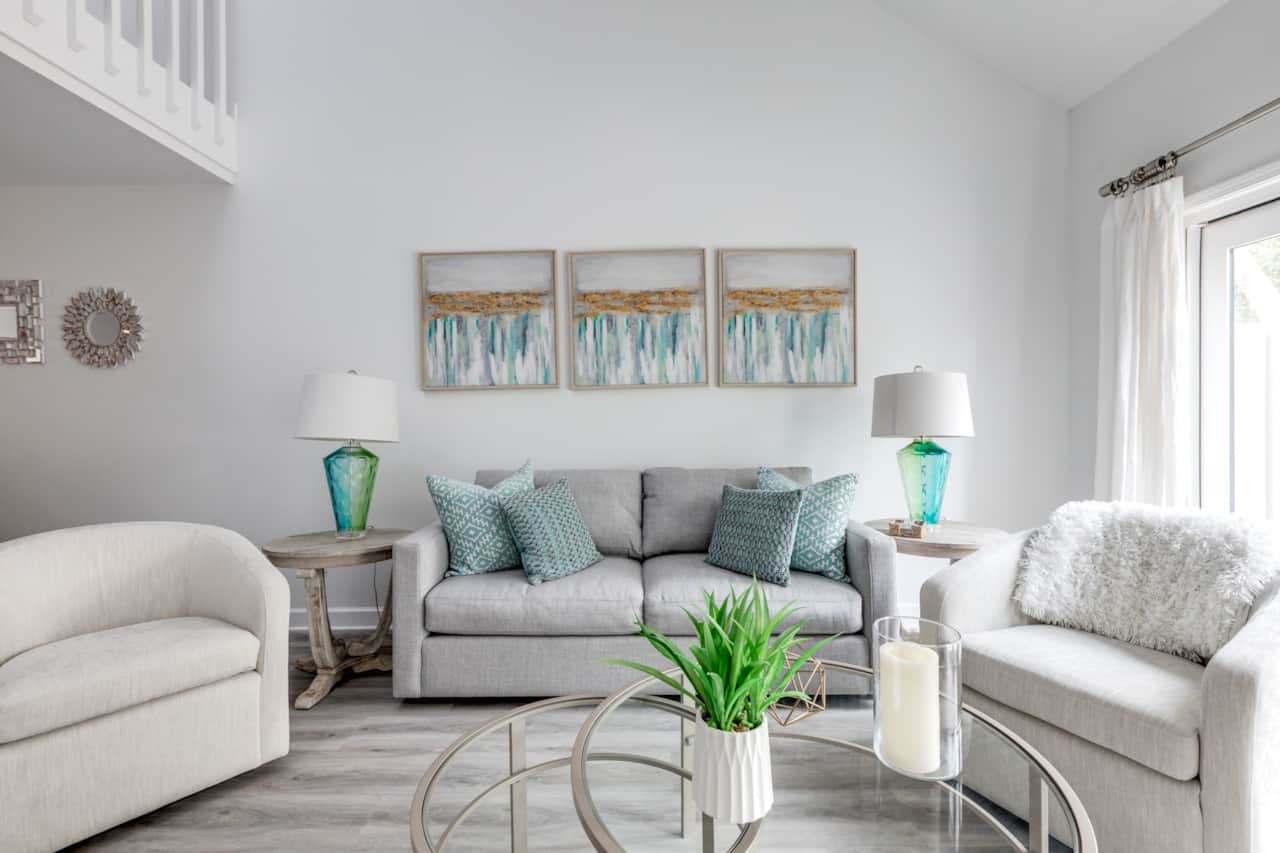 Spacious living room overlooking the back patio with a Smart TV.