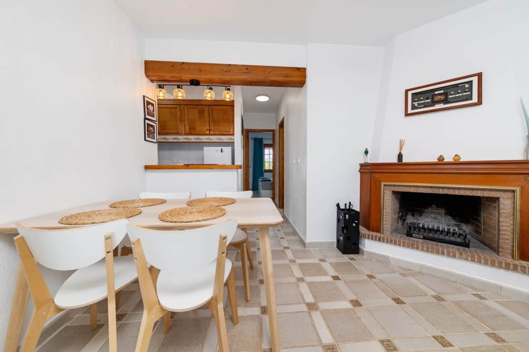 Dining table, fireplace