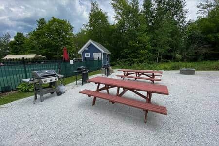 In the summer picnic tables ad grills are available