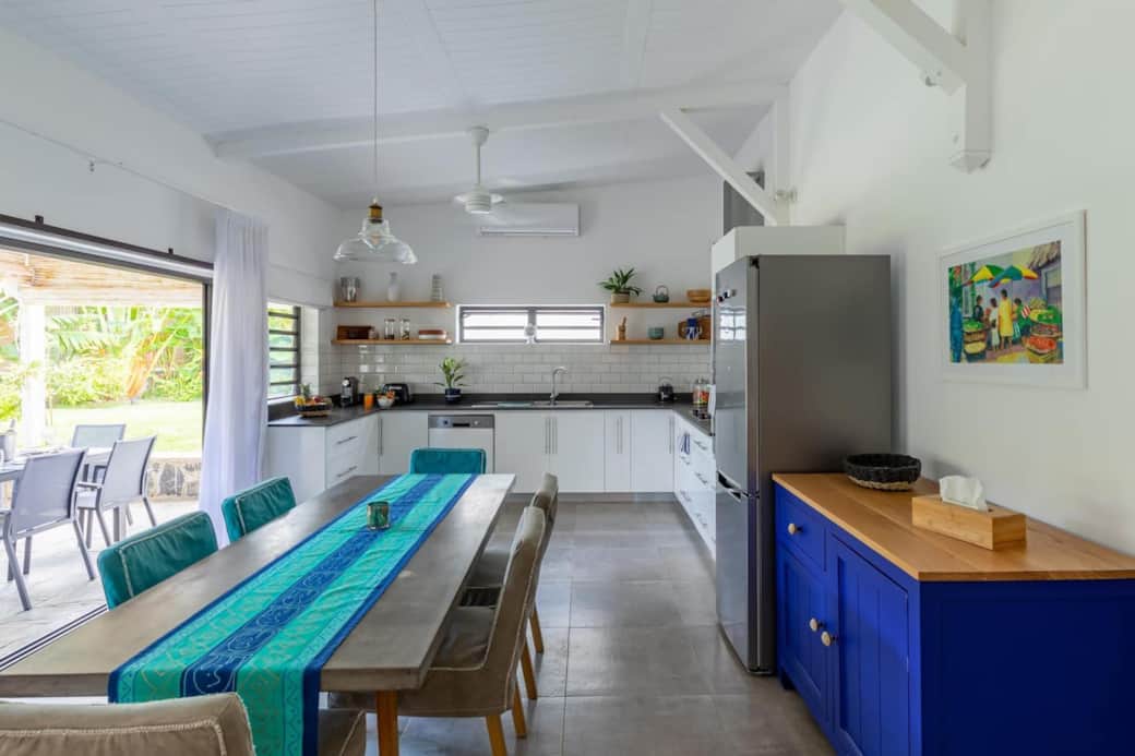 Living Room overlooking fully equipped kitchen with oven and dishwasher. Dining table for 6