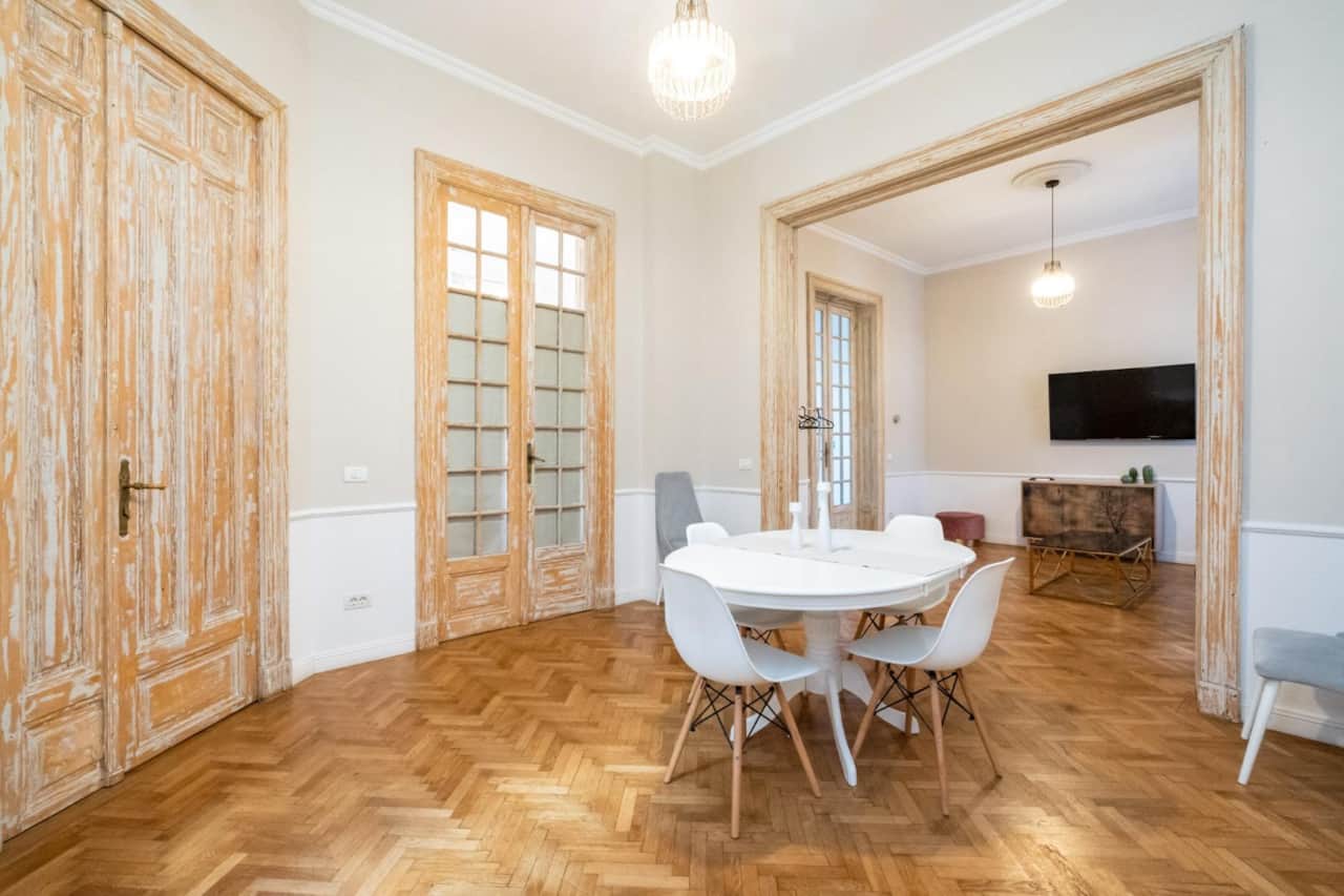 Open-plan dining space connected to living room in Lascar Catargiu Suite
