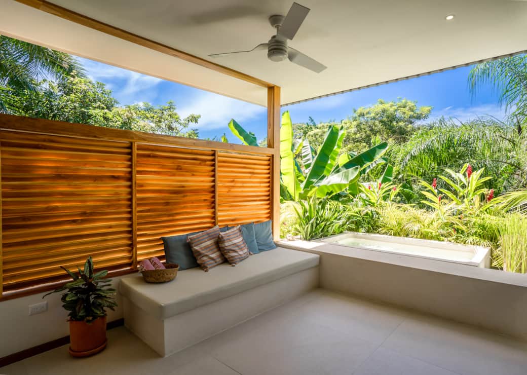 Outdoor lounge area with private pool