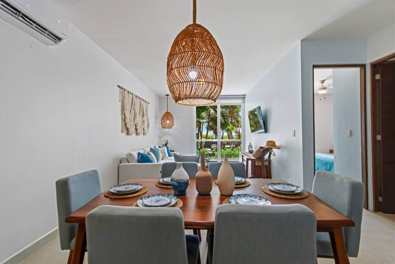 Gather around the dining table, comfortably seating up to six guests, and enjoy Caribbean Sea views during your meals. The dining area also features air conditioning to keep the space cool and comfortable.