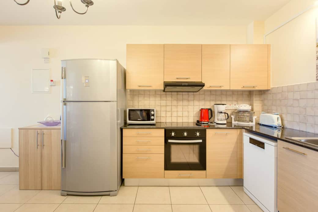 Fully equipped kitchen with dish washing  and washing machines