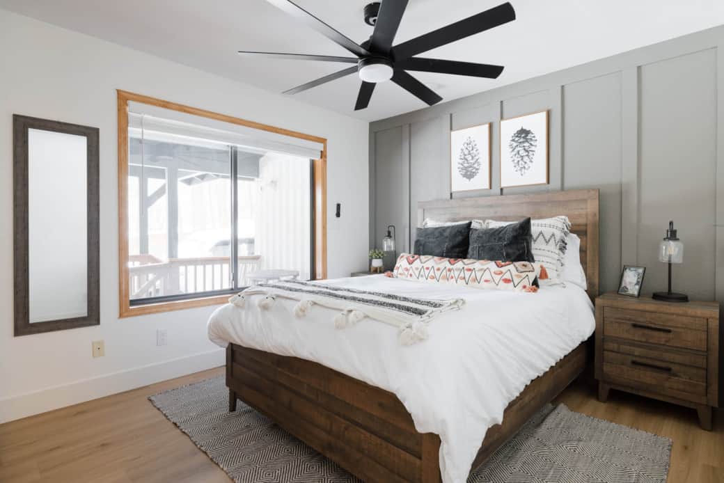 The third bedroom has a queen bed and view of the deck.