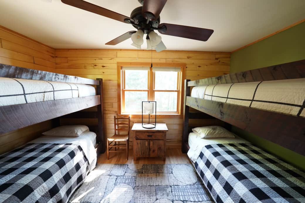 Two bunkbeds - 4 singles on main level. 