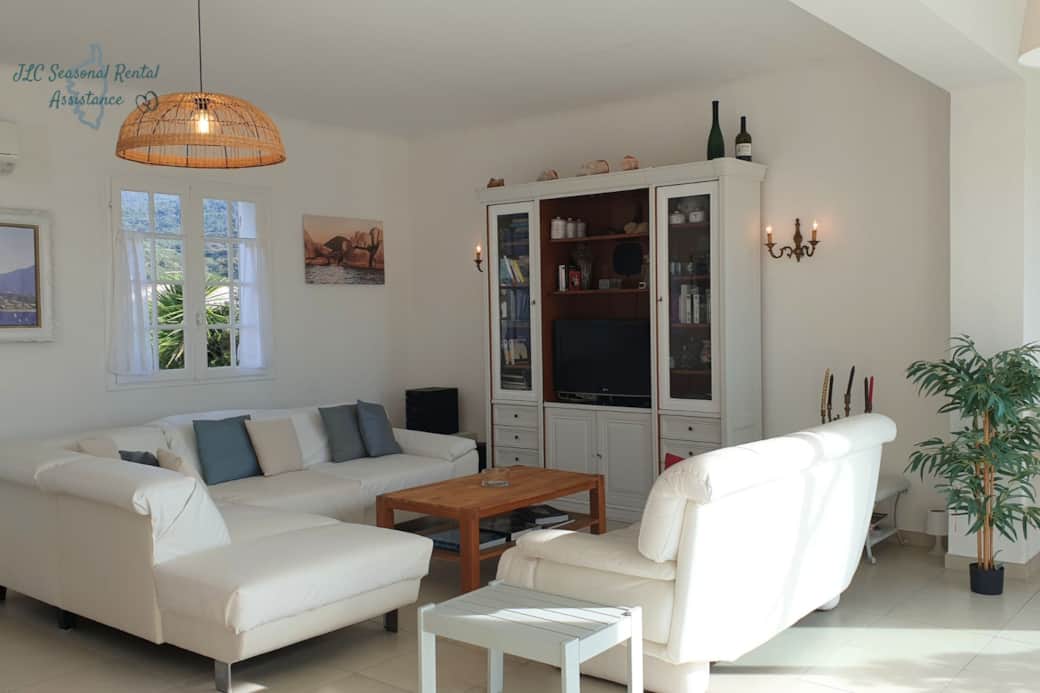 Comfortable living room opening onto the terrace