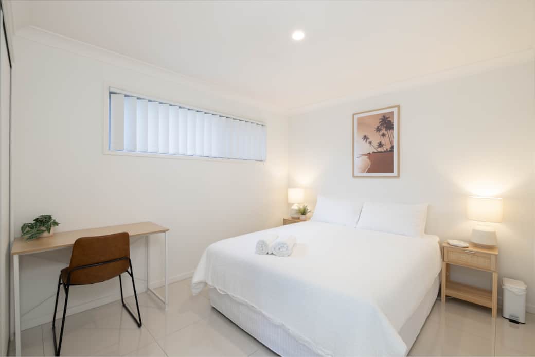 Bedroom 1: Peaceful bedroom with cozy design and ample storage