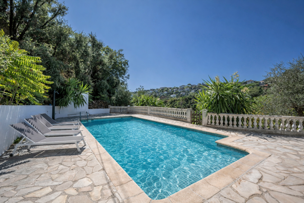 Sunny hillside pool retreat